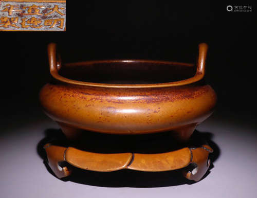 A COPPER DOUBLE EAR TRIPOD CENSER