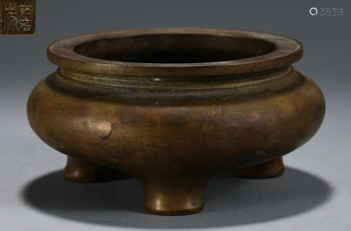 A COPPER CASTED TRIPOD CENSER