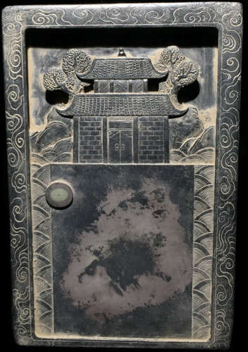 AN INK SLAB CARVED WITH HOUSE