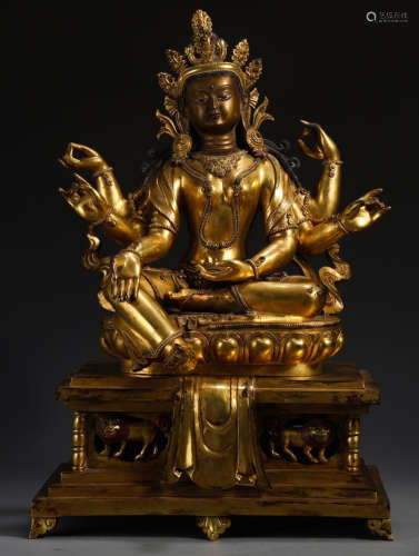 A GILT BRONZE GUANYIN BUDDHA STATUE WITH SIX ARMS