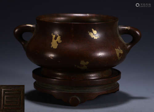 A COPPER CENSER WITH EARS