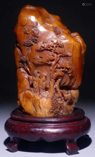 A TIANHUANG STONE PENDANT CARVED WITH LANDSCAPE