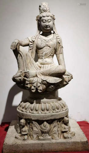 A STONE GUANYIN BUDDHA STATUE
