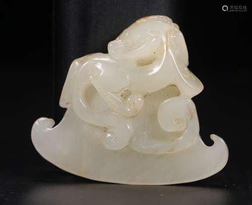 A HETIAN JADE AX CARVED WITH BEAST