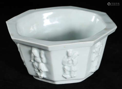 A WHITE GLAZE FLOWERPOT CARVED WITH FIGURE