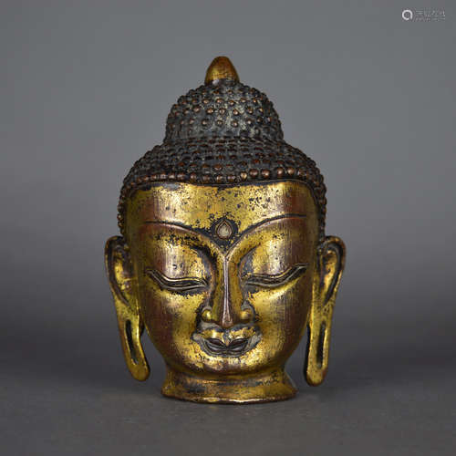 A Chinese Gild Bronze Buddha Head Ornament