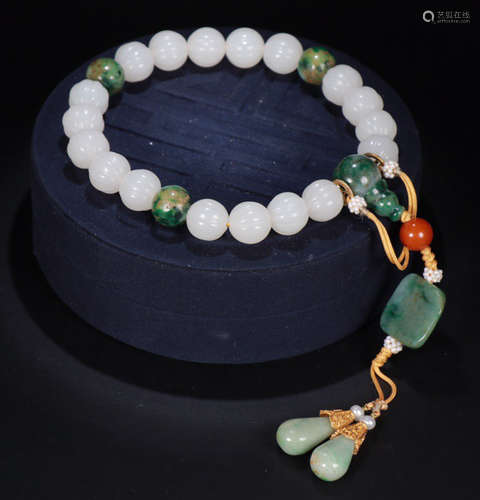 A HETIAN WHITE JADE STRING BRACELET