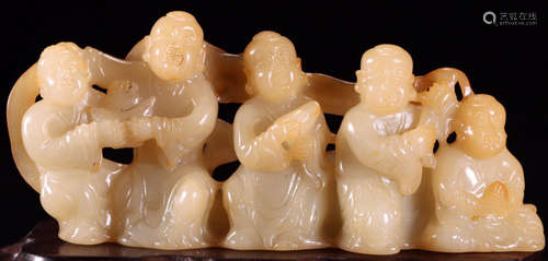 A HETIAN JADE BRUSH HOLDER CARVED WITH FIGURE