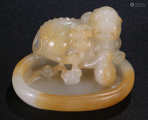 A HETIAN JADE BRUSH WASHER CARVED WITH LION