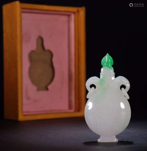 A JADEITE SNUFF BOTTLE WITH EARS