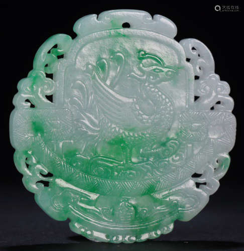 A JADEITE TABLET CARVED WITH BEAST