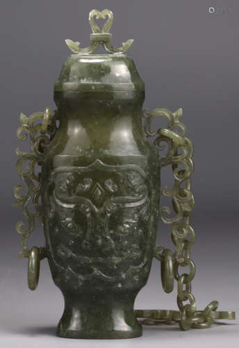 A HETIAN GREEN JADE VASE CARVED WITH BEAST PATTERN