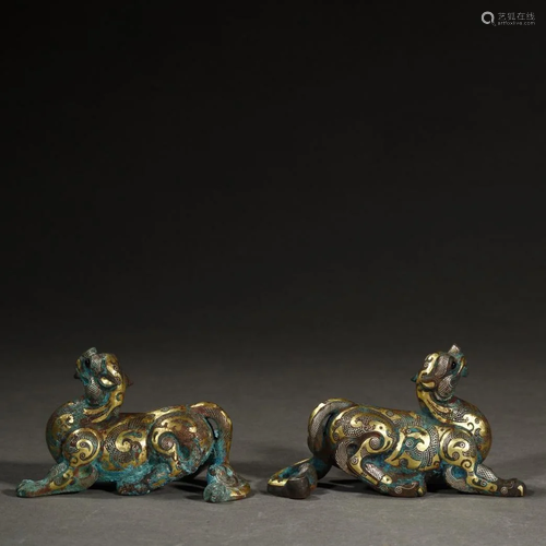 A PAIR OF ANCIENT CHINESE GOLD AND SILVER-I…