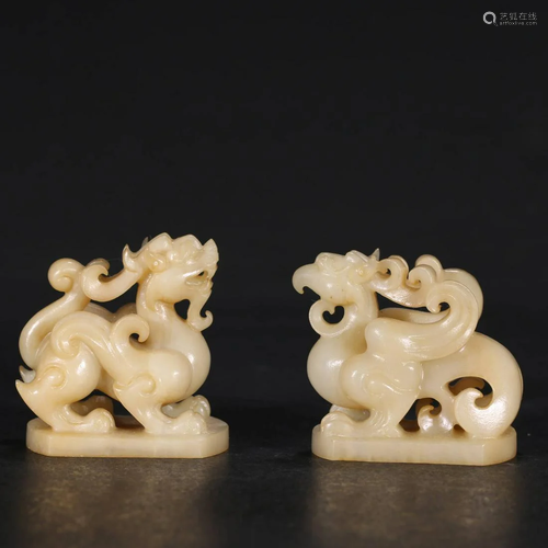 ANCIENT CHINESE A PAIR OF WHITE JADE DRAGO…