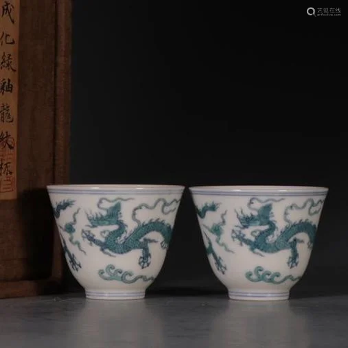 A PAIR OF ANCIENT CHINESE GREEN-GLAZED CUPS