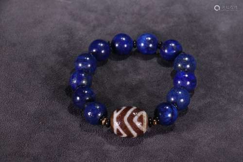 A Chinese Lapis Lazuli Bracelet With Dzi