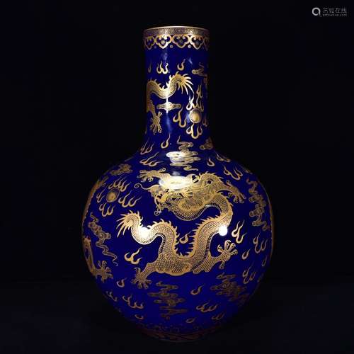 A Chinese Porcelain Blue Glazed Gold Dragon Bottle Vase