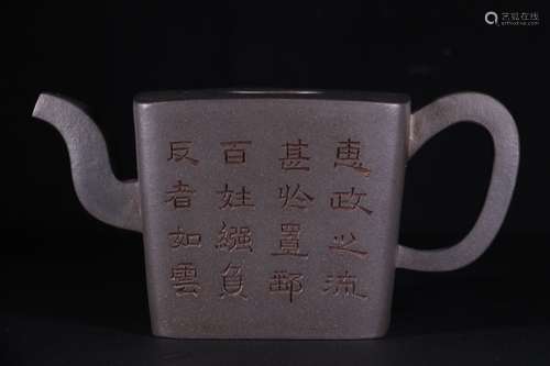 A Chinese Zisha Teapot With Poetry Carving