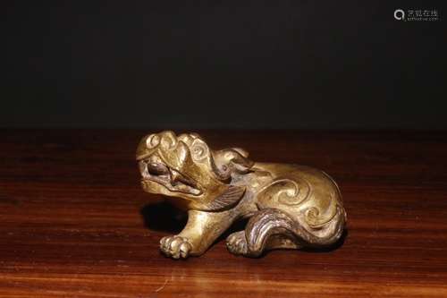 A Chinese Gilt Bronze Beast Shaped Paperweight