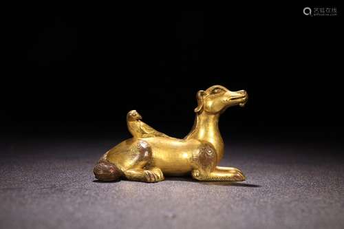 A Chinese Gilt Bronze Dog Ornament