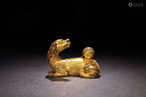 A Chinese Gilt Bronze Beast Ornament