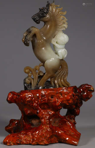 A HETIAN JADE CARVED HORSE SHAPE PENDANT