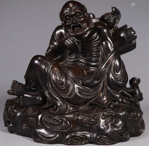 A ZITAN WOOD CARVED BODHIDHARMA BUDDHA STATUE