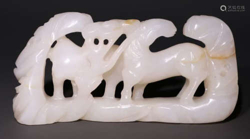 A HETIAN JADE CARVED HORSE SHAPE PENDANT