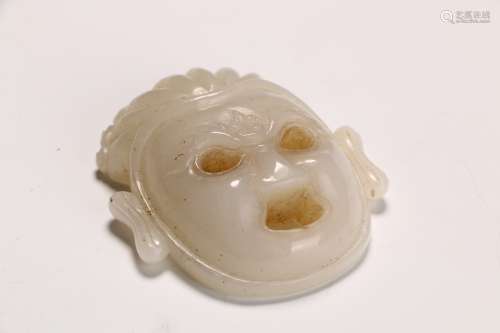 A Hetian Jade Carving with Human Face Design in the seventeenth century
