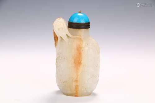A Hetian Jade Snuff Bottle with Dragon Design in the seventeenth century
