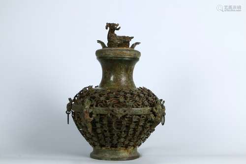 A Bronze Zun Vessel with Taotie Design and Sheep-shaped Lid       in the third century