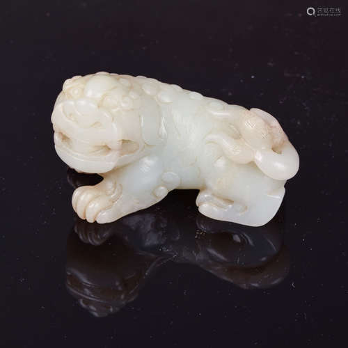 A Chinese Hetian Jade Carved Lion Ornament