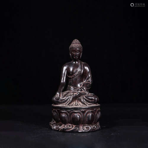 A Chinese Red Sandalwood Carved Sakyamuni Statue