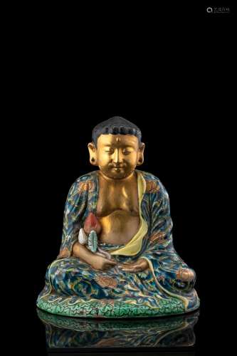 A small polychrome ceramic Buddha China, Republic period (1912-1949) (h. 21.5 cm.)...