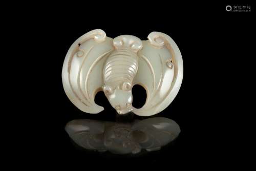 A celadon jade carving of a bat and a coin China, 20th century (l. 5.5 cm.)...