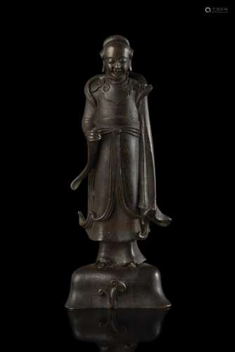 A dark bronze figure of a dignitary China, Ming dynasty, 18th century (h. 25.5 cm.)...