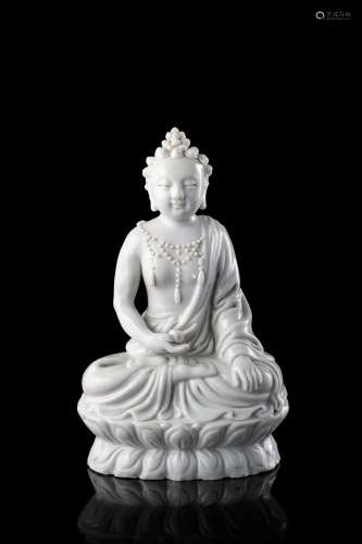 A blanc de chine seated Bodhisattva, holding a fruit in her right hand (defects) China, 19th century Provenance Milanese private collection Gianni Russo Antiquities (h. 15 cm.)...