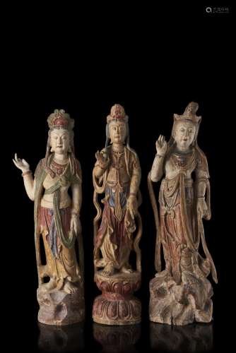 Three carved wood sculptures of Bodhisattva (defects and losses) China, late Ming dynasty, XVII century (h. max 83.5 cm.)...
