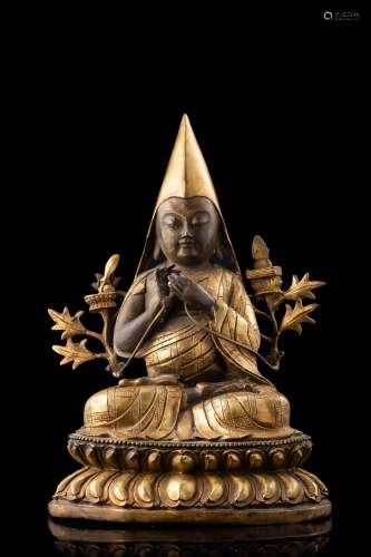 A burnished and gilt metal Tsongkhapa (defects) China, 20th century (h. 30 cm.)...
