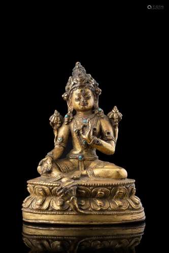 A small bronze sculpture of Tara with turquoise inserts (defects) Tibet, 18th century (h. 12.5 cm.)...