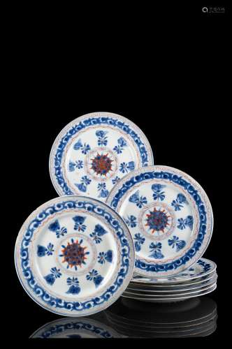 A group of eight export plates with floral decorations (defects) 18th century (d. 22 cm.)...