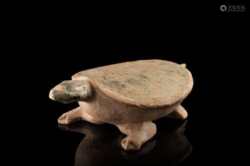 A pottery turtle with traces of silver-green pigment, with thermoluminescence test China, Han dynasty (206 b.C - 221 a.C) (l. max 22 cm.)...