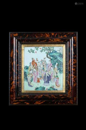 A porcelain plaque decorated in polychrome enamels with the Daoist Immortals, decorated to the back, mounted in a tortoiseshell frame China, 19th century (30x34 cm.) This lot may be subject to Import/Export restrictions due to CITES regul...