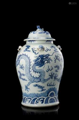 A blue and white dragon jar (slight defects) China, 19th century (h. 42 cm.)...