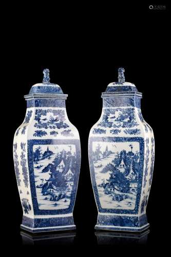 A pair of squared blue and white porcelain vases with lids, landscapes decorated and with pho dogs on the lids China, 18th/19th century (h. 58 cm.)...