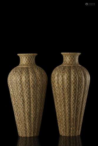 A pair of ivory vases decorated with polychrome floral motifs Indian Art, 20th century (h. max 53.5 cm.) This lot may be subject to Import/Export restrictions due to CITES regulations in some extra UE countries...