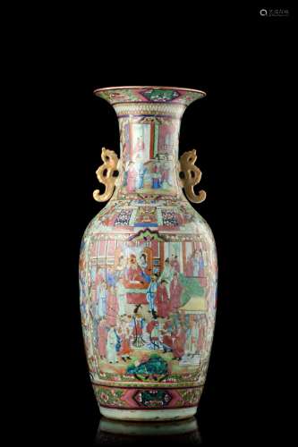 A two-handled Canton porcelain vase with figures, gilded handles (defects) China, 19th century (h. 62 cm.)...