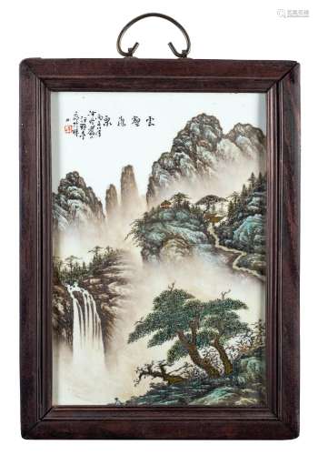 A porcelain plaque decorated with mountains and rivers, with calligraphy, signed Wang Yeting, frame not original China, 20th century (36.5x25.8 cm.)...