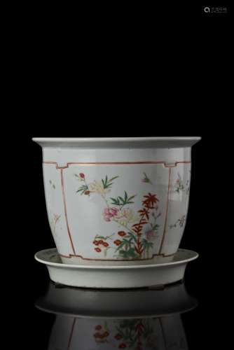 A white porcelain pot and saucer decorated with polychrome flowers, ( the saucer possibly adjoint ) (defects) China, early 20th century (h. 21.5 cm.)...