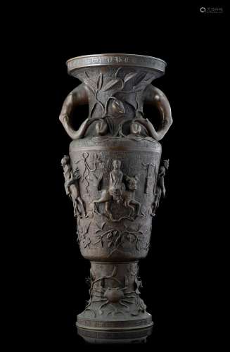A large bronze vase decorated with relief figures, phytomorphic handles (defects) Japan, Meiji period (1868-1912) (h. 76 cm.)...